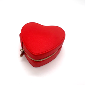 Red heart-shaped jewelry box with gold zipper