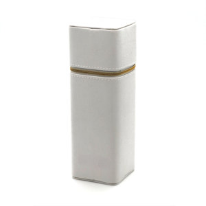 Tall white fabric cosmetic brush holder with gold zipper closure