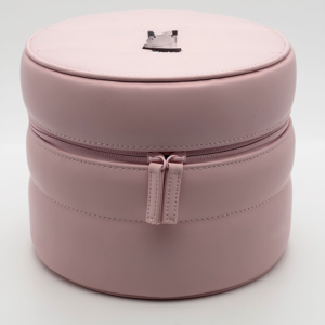 Closed round pink faux leather makeup bag with double zippers